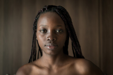 Young black African American woman portrait in indoors