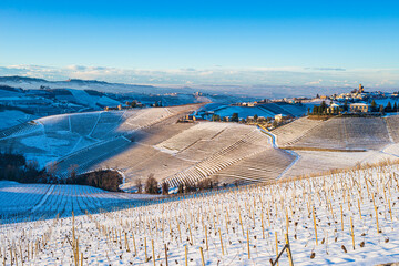Italy Piedmont: wine yards unique landscape winter sunset, Serralunga d'Alba medieval village...