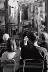 group of people sitting and talking