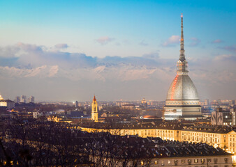 Turin, Italy. Panorama from Monte dei Cappuccini (Cappuccini's Hill) at sunset with Alps mountains and Mole Antonelliana