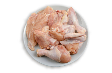 Raw chicken meat on a plate. Isolated on a white background.The view from the top. Healthy eating