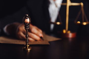 Notary's public pen and stamp. Person in office approved documents.