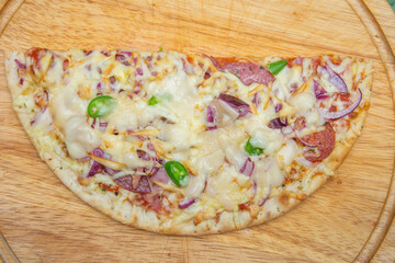 Homemade  pizza with onion and pepperoni