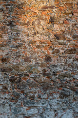The texture of the old stone wall. Facade texture of an old house
