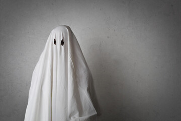 white ghost on gray background