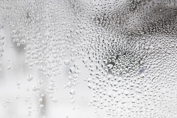 water drops on glass in winter