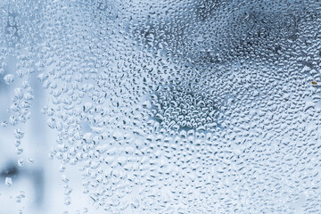 water drops on glass in winter