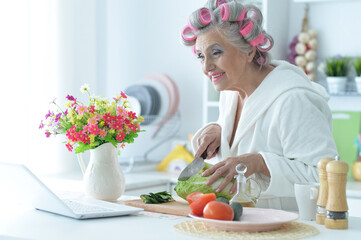 Senior woman in  hair rollers