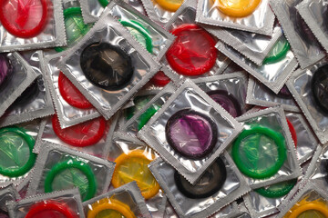 Colorful condoms background.