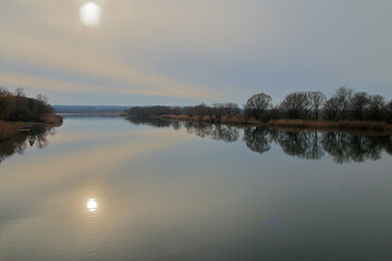 Calm river on a cloudy winter day.