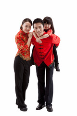 Obraz premium Portrait of family,father carrying daughter on back,in Tang suits 