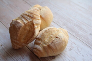 three fresh rolls, fresh, crispy bread, nicely baked wheat rolls, crispy bread crust