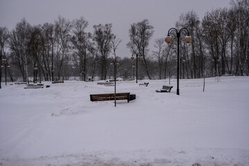 an old provincial town with old temples and parks covered with snow in winter