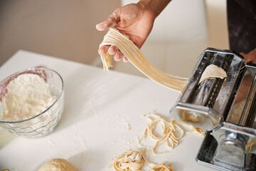Homemade spaghetti cooking process close up photo