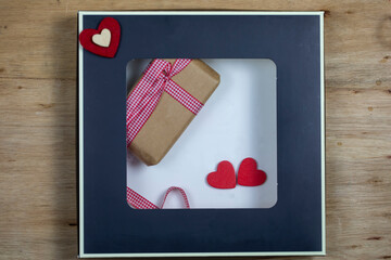 Fototapeta premium Gift box and hearts, Christmas present, valentine day surprise, birthday concept 