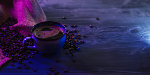 Obraz na płótnie Canvas Ceramic cup with espresso coffee . Trendy neon shades of light. Copy space