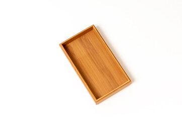 open wooden box top view on white background