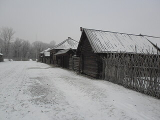 An ancient village, snow fell.