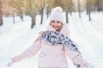 Fototapeta na wymiar Beautiful smiling woman winter portrait