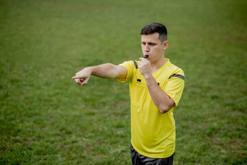 Referee indicates a violation of the rules. Concept of sport, rules violation, controversial...