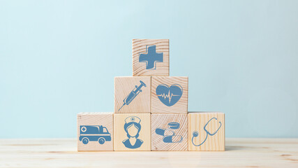 Good health concept, wooden cubes on blue background