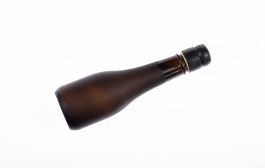 black bottle of champagne on a white background
