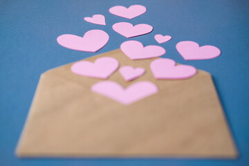 paper envelope and hearts . the theme of Valentine's day