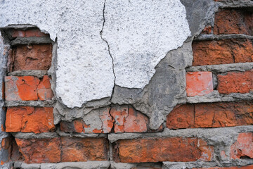 Close-up brick wall, broken red brick background, selective focus