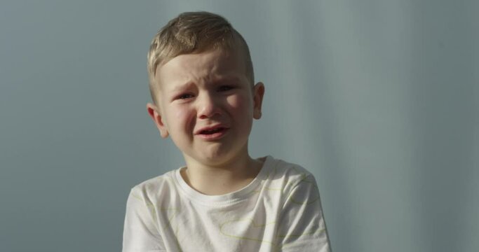 Portrait of a Little Boy Crying Indoors Shot on Red Camera
