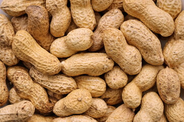 Peanut background texture. Composition of peanuts serving to make oil, peanut butter. Great for healthy and dietary nutrition. Concept of: condiments, dried fruit, food.