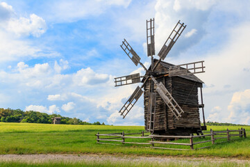 Fototapeta na wymiar Old wooden windmill in Pyrohiv (Pirogovo) village near Kiev, Ukraine