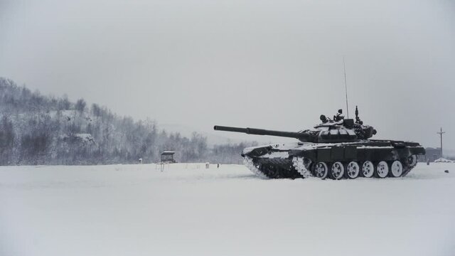 Snow-covered shooting range field. Tank equipment testing
