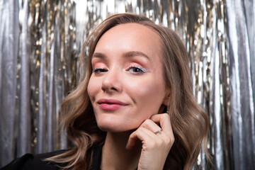 Portrait of a girl with New Year's makeup