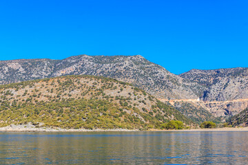 Naklejka na ściany i meble View of the Taurus mountains and the Mediterranean sea near Demre, Antalya province in Turkey