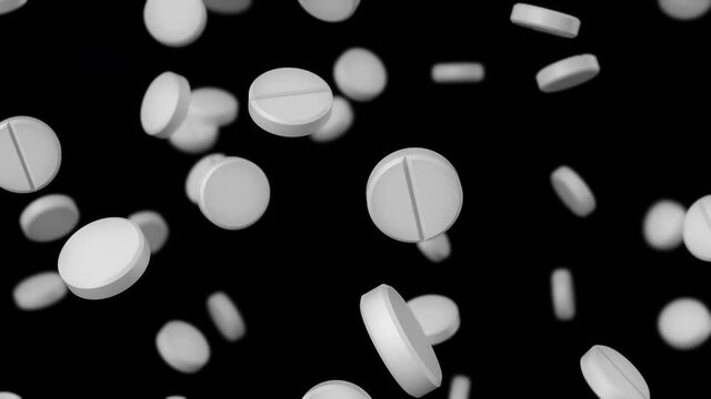 White round pills falling down. Falling drugs on a transparent background. Pharmaceutical business concept. Looping 4k animation, ProRes 4444