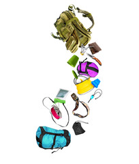 Fototapeta na wymiar Various travel accessories falling from military backpack isolated on white background