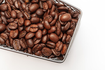 Shopping cart with coffee beans on a white background