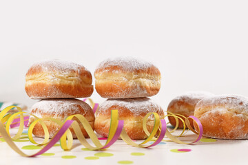 'Berliner Pfannkuchen', a traditional German donut like dessert filled with jam made from sweet yeast dough fried in fat. Traditional served during carnival.