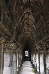Fototapeta na wymiar Hallways, doorways and columns of Angkor Wat temple complex