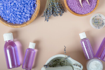 Fototapeta na wymiar spa concept - towels and lavender flowers