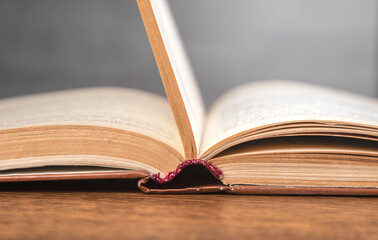 open book on wooden table