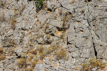 Natural texture of a mountain cliff rock for background