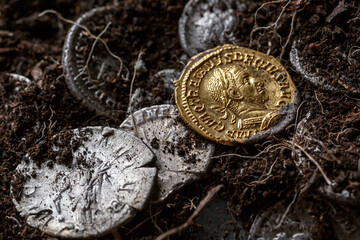 A treasure of Roman gold and silver coins.Trajan Decius. AD 249-251. AV Aureus.Ancient coin of the...