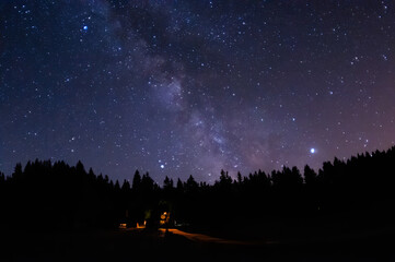 Beautiful night sky over the forest, Moravian-Silesian Beskids, Milky way in the mountains....