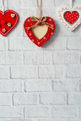 decorative red valentine on white brick background, valentines day concept