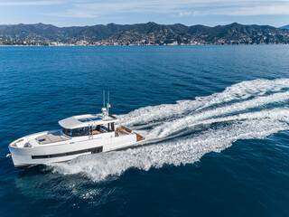 Fototapeta premium motor yacht in navigation aerial view