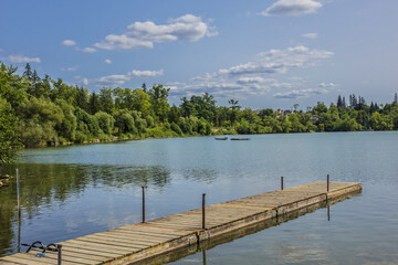 View of beautiful public Lake Wilcox Park. Park is 5.48 hectares of exceptional waterfront parkland reflective of area cultural, historical and environmental heritage. Richmond Hill, Ontario, Canada.