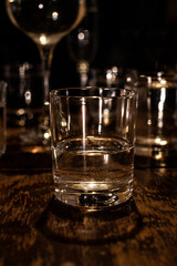 on a wooden background a glass with a drink
