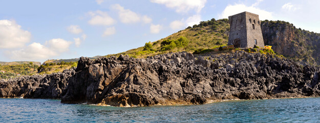 Ancient Bourbons turret along the rocky Cilento coastline, south Tyrrhenian Sea. Panoramic...