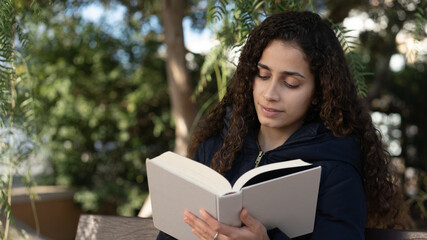 Fototapeta premium woman reading a book